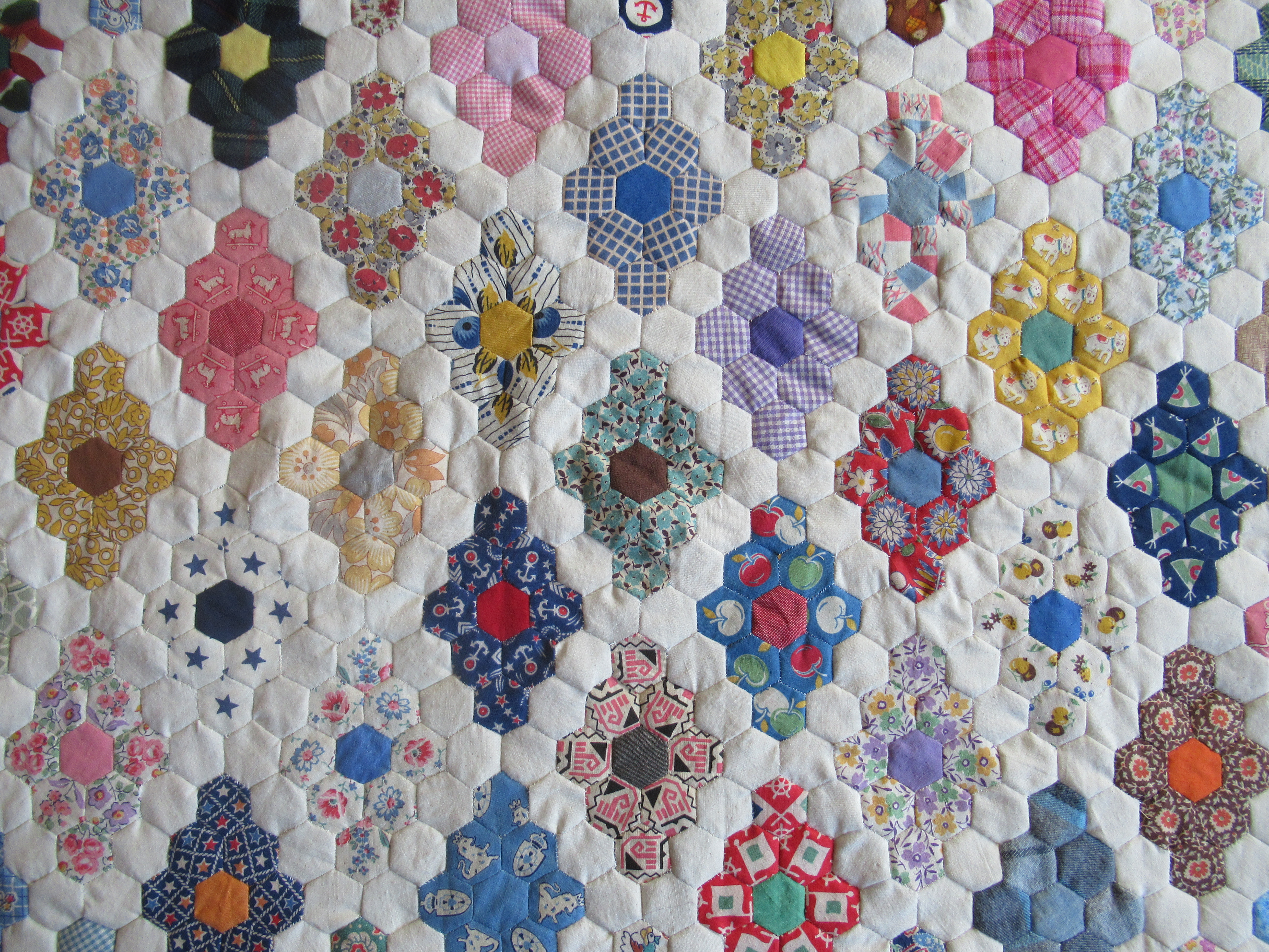 WIP Scrap Fabric English Paper Pieced Hexagon Quilt : r/quilting